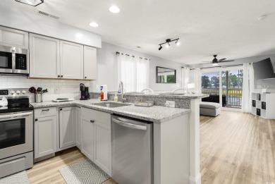 This beautiful beach condo located at River Oaks Golf Plantation on  in South Carolina - for sale on GolfHomes.com, golf home, golf lot