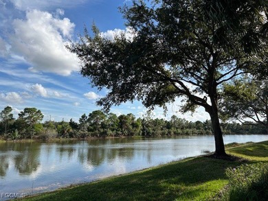 WELCOME HOME! ENJOY SPECTACULAR LAKE & SUNRISE VIEWS from your on Colonial Country Club in Florida - for sale on GolfHomes.com, golf home, golf lot