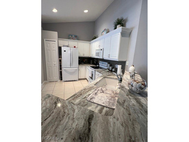 WELCOME HOME! ENJOY SPECTACULAR LAKE & SUNRISE VIEWS from your on Colonial Country Club in Florida - for sale on GolfHomes.com, golf home, golf lot