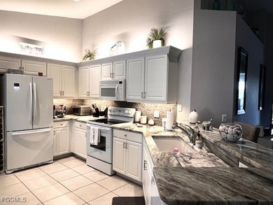 WELCOME HOME! ENJOY SPECTACULAR LAKE & SUNRISE VIEWS from your on Colonial Country Club in Florida - for sale on GolfHomes.com, golf home, golf lot