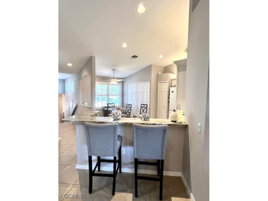 WELCOME HOME! ENJOY SPECTACULAR LAKE & SUNRISE VIEWS from your on Colonial Country Club in Florida - for sale on GolfHomes.com, golf home, golf lot