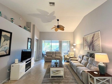 WELCOME HOME! ENJOY SPECTACULAR LAKE & SUNRISE VIEWS from your on Colonial Country Club in Florida - for sale on GolfHomes.com, golf home, golf lot