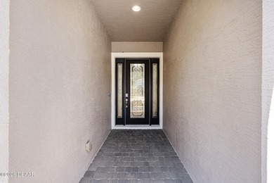 Welcome to 209 Heatherwood Court, perfectly positioned on a on Plantation Bay Golf and Country Club in Florida - for sale on GolfHomes.com, golf home, golf lot