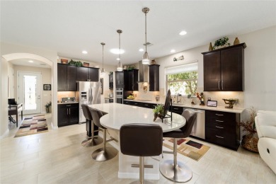 Enjoy resort-style living at its best in this one-of-a-kind and on Stone Creek Golf Club in Florida - for sale on GolfHomes.com, golf home, golf lot