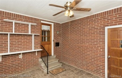 Meticulously maintained brick Ranch on a double lot in South on Western Golf and Country Club in Michigan - for sale on GolfHomes.com, golf home, golf lot