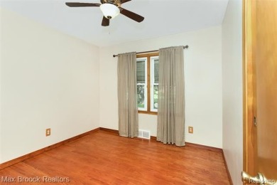 Meticulously maintained brick Ranch on a double lot in South on Western Golf and Country Club in Michigan - for sale on GolfHomes.com, golf home, golf lot