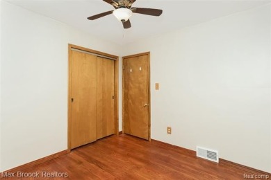 Meticulously maintained brick Ranch on a double lot in South on Western Golf and Country Club in Michigan - for sale on GolfHomes.com, golf home, golf lot