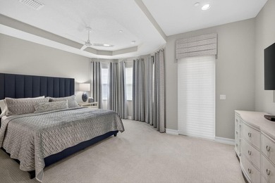 Come see this beautifully upgraded Toll Brothers Pesaro model on Jupiter Country Club in Florida - for sale on GolfHomes.com, golf home, golf lot