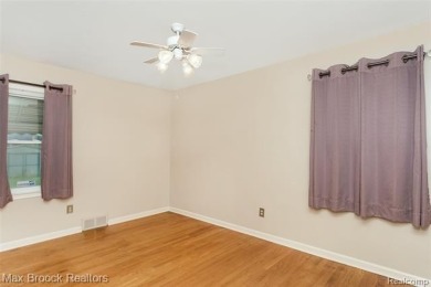 Meticulously maintained brick Ranch on a double lot in South on Western Golf and Country Club in Michigan - for sale on GolfHomes.com, golf home, golf lot