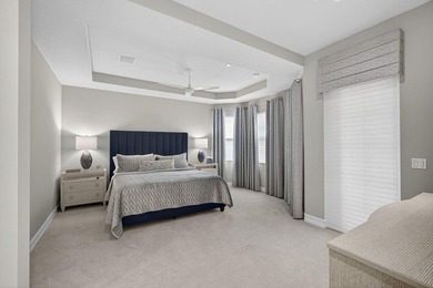 Come see this beautifully upgraded Toll Brothers Pesaro model on Jupiter Country Club in Florida - for sale on GolfHomes.com, golf home, golf lot