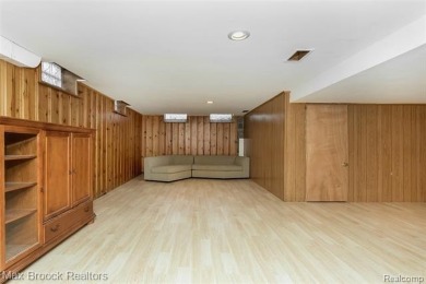 Meticulously maintained brick Ranch on a double lot in South on Western Golf and Country Club in Michigan - for sale on GolfHomes.com, golf home, golf lot