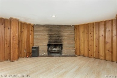 Meticulously maintained brick Ranch on a double lot in South on Western Golf and Country Club in Michigan - for sale on GolfHomes.com, golf home, golf lot