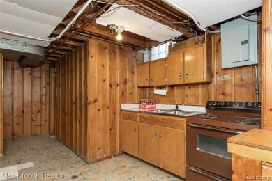 Meticulously maintained brick Ranch on a double lot in South on Western Golf and Country Club in Michigan - for sale on GolfHomes.com, golf home, golf lot