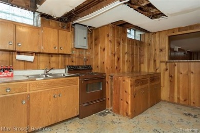 Meticulously maintained brick Ranch on a double lot in South on Western Golf and Country Club in Michigan - for sale on GolfHomes.com, golf home, golf lot