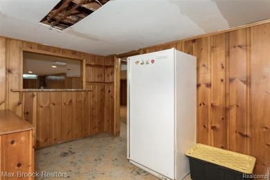 Meticulously maintained brick Ranch on a double lot in South on Western Golf and Country Club in Michigan - for sale on GolfHomes.com, golf home, golf lot