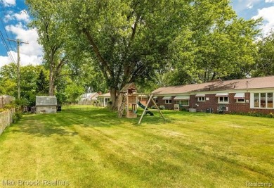 Meticulously maintained brick Ranch on a double lot in South on Western Golf and Country Club in Michigan - for sale on GolfHomes.com, golf home, golf lot