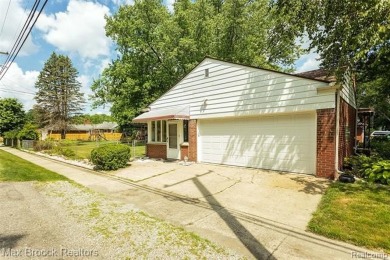 Meticulously maintained brick Ranch on a double lot in South on Western Golf and Country Club in Michigan - for sale on GolfHomes.com, golf home, golf lot