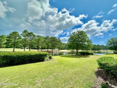 Sunset Beach, 1st floor condo with a view! Open floor plan with on Sandpiper Bay Golf and Country Club in North Carolina - for sale on GolfHomes.com, golf home, golf lot