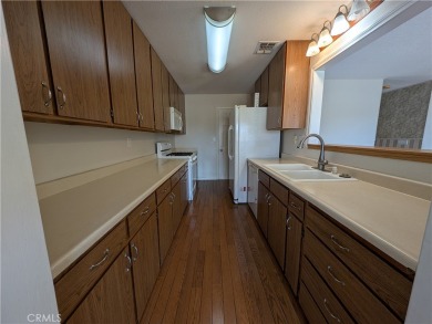 Extremely charming and well taken care of, this two-bedroom on Silver Lakes Golf Course in California - for sale on GolfHomes.com, golf home, golf lot