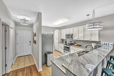 Immaculate, fully furnished, turnkey, walkout level waterfront on Mariners Landing Golf and Country Club in Virginia - for sale on GolfHomes.com, golf home, golf lot