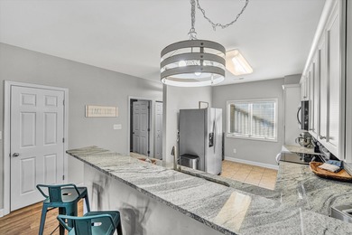 Immaculate, fully furnished, turnkey, walkout level waterfront on Mariners Landing Golf and Country Club in Virginia - for sale on GolfHomes.com, golf home, golf lot