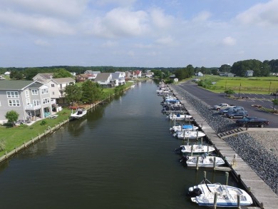 Gorgeous Water View Home in Captain's Cove Golf & Yacht Club! on Captains Cove Golf and Yacht Club in Virginia - for sale on GolfHomes.com, golf home, golf lot