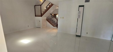 Lovely townhome. It features fresh paint, new porcelain tile on on Woodmont Country Club in Florida - for sale on GolfHomes.com, golf home, golf lot