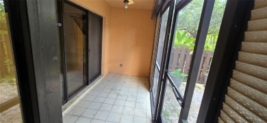 Lovely townhome. It features fresh paint, new porcelain tile on on Woodmont Country Club in Florida - for sale on GolfHomes.com, golf home, golf lot