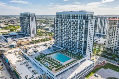 Live the urban lifestyle at 5252 Paseo! Bright and modern 1 on Doral Golf Resort in Florida - for sale on GolfHomes.com, golf home, golf lot