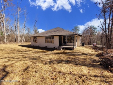 This stunning 3-bedroom, 2.5-bath Prairie-style custom home on Druid Hills Golf Club in Tennessee - for sale on GolfHomes.com, golf home, golf lot