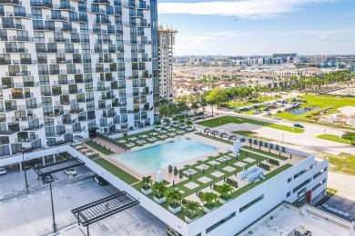Live the urban lifestyle at 5252 Paseo! Bright and modern 1 on Doral Golf Resort in Florida - for sale on GolfHomes.com, golf home, golf lot