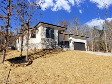 This stunning 3-bedroom, 2.5-bath Prairie-style custom home on Druid Hills Golf Club in Tennessee - for sale on GolfHomes.com, golf home, golf lot