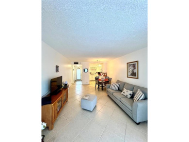 Envision yourself thriving in this amazing 55+ community in on Sunrise Lakes Phase III in Florida - for sale on GolfHomes.com, golf home, golf lot