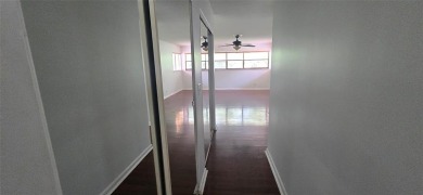 Lovely townhome. It features fresh paint, new porcelain tile on on Woodmont Country Club in Florida - for sale on GolfHomes.com, golf home, golf lot