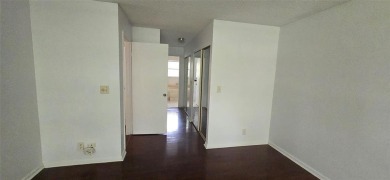 Lovely townhome. It features fresh paint, new porcelain tile on on Woodmont Country Club in Florida - for sale on GolfHomes.com, golf home, golf lot