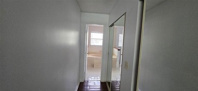 Lovely townhome. It features fresh paint, new porcelain tile on on Woodmont Country Club in Florida - for sale on GolfHomes.com, golf home, golf lot