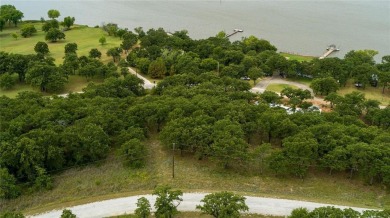 Almost 1 acre undeveloped build site with breathtaking views of on Nocona Hills Golf Course in Texas - for sale on GolfHomes.com, golf home, golf lot