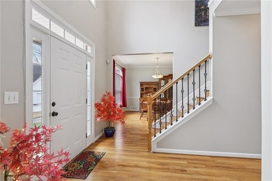 Nestled on a rare, just-under-an-acre lot at the end of a quiet on Collins Hill Golf Club in Georgia - for sale on GolfHomes.com, golf home, golf lot