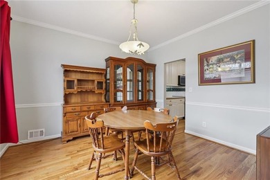 Nestled on a rare, just-under-an-acre lot at the end of a quiet on Collins Hill Golf Club in Georgia - for sale on GolfHomes.com, golf home, golf lot