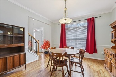 Nestled on a rare, just-under-an-acre lot at the end of a quiet on Collins Hill Golf Club in Georgia - for sale on GolfHomes.com, golf home, golf lot