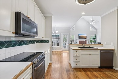 Nestled on a rare, just-under-an-acre lot at the end of a quiet on Collins Hill Golf Club in Georgia - for sale on GolfHomes.com, golf home, golf lot