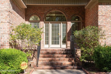 Stunning, custom-built all-brick home on a private 1-acre corner on Cypress Landing Golf Club in North Carolina - for sale on GolfHomes.com, golf home, golf lot