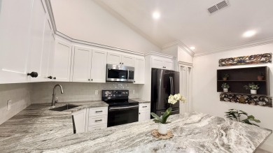 Gorgeous 3 Bedroom, 2 Bathroom Villa in Palm Beach Gardens! This on Old Palm Golf Club in Florida - for sale on GolfHomes.com, golf home, golf lot