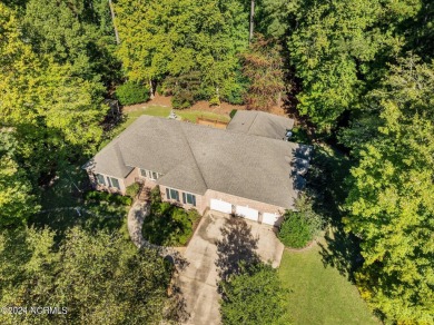 Stunning, custom-built all-brick home on a private 1-acre corner on Cypress Landing Golf Club in North Carolina - for sale on GolfHomes.com, golf home, golf lot