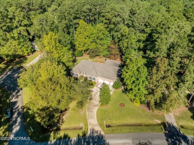 Stunning, custom-built all-brick home on a private 1-acre corner on Cypress Landing Golf Club in North Carolina - for sale on GolfHomes.com, golf home, golf lot