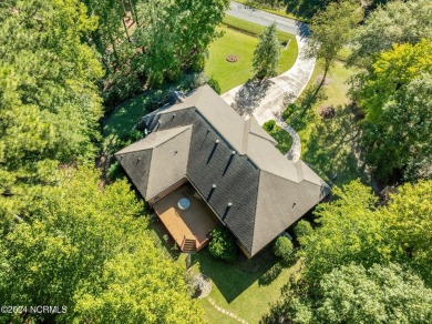 Stunning, custom-built all-brick home on a private 1-acre corner on Cypress Landing Golf Club in North Carolina - for sale on GolfHomes.com, golf home, golf lot