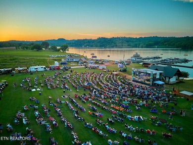 Beautiful .21-acre lot with golf and water views located in the on Tennessee National Golf Club in Tennessee - for sale on GolfHomes.com, golf home, golf lot