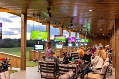 Beautiful .21-acre lot with golf and water views located in the on Tennessee National Golf Club in Tennessee - for sale on GolfHomes.com, golf home, golf lot