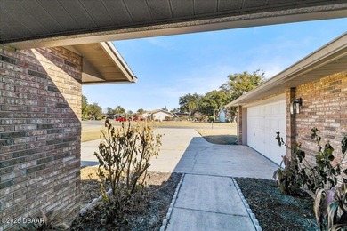 Welcome to this beautifully updated 3-bedroom, 2-bath on Spruce Creek Golf Club in Florida - for sale on GolfHomes.com, golf home, golf lot