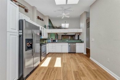 This stunning three-bedroom, two-bath freestanding villa is on Twin Isles Country Club in Florida - for sale on GolfHomes.com, golf home, golf lot